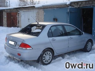 Битый автомобиль Mitsubishi Lancer